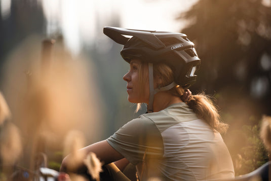 female rider wearing Targon wile sitting in field