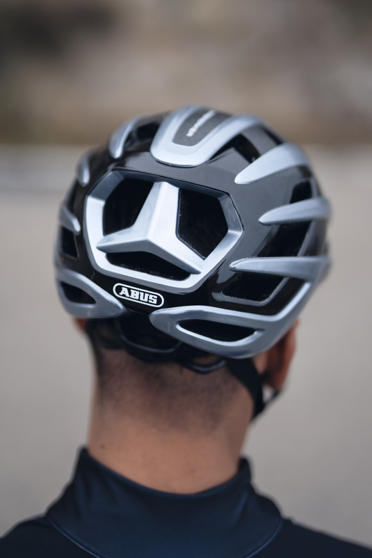 image from rear of  person wering graphite silver AirBreaker 2.0 helmet