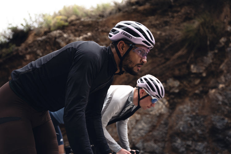 Two cyclists wearing ABUS Airbreaker 2.0 bike helmets
