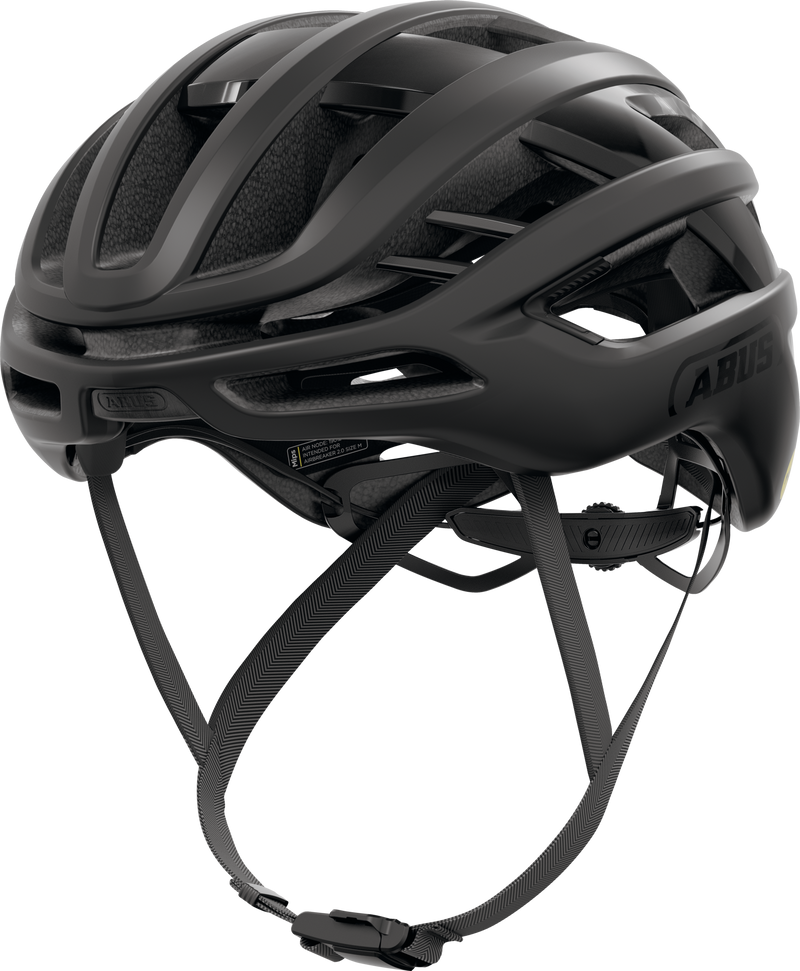Load image into Gallery viewer, Black bicycle helmet on a white background #color_velvet black

