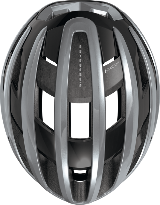 Gray bicycle helmet with a sleek design on a white background.