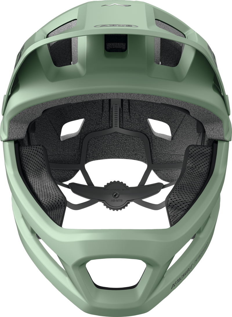 Load image into Gallery viewer, Close-up of a green helmet with visible branding on a white background #color_mist green
