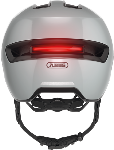 rear view of race grey ABUS HUD-y helmet with light on