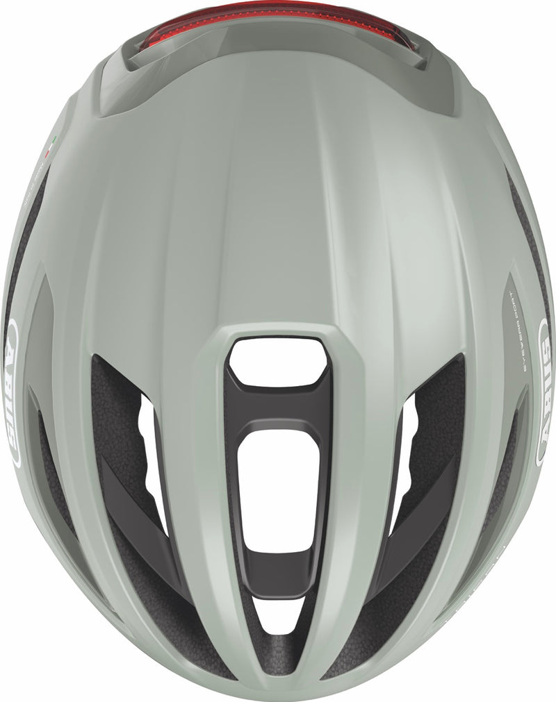 Load image into Gallery viewer, Green bicycle helmet with a red light on a white background#color_frosted green
