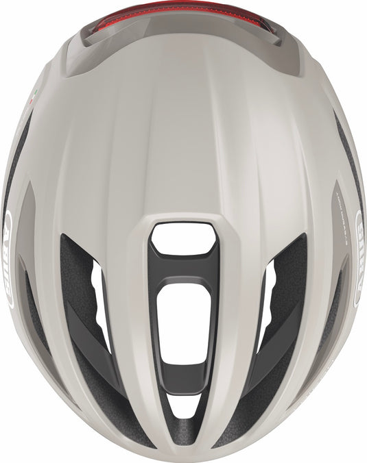 sand beige bicycle helmet with black accents on a white background